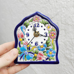 L'horloge "Arte" 12 cm.