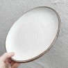 Set di 2 piatti in ceramica.