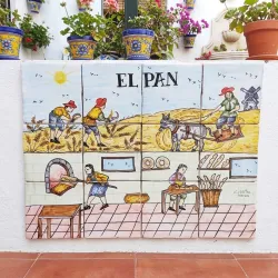 Hand-painted ceramic tile mural "EL PAN" for the wall.